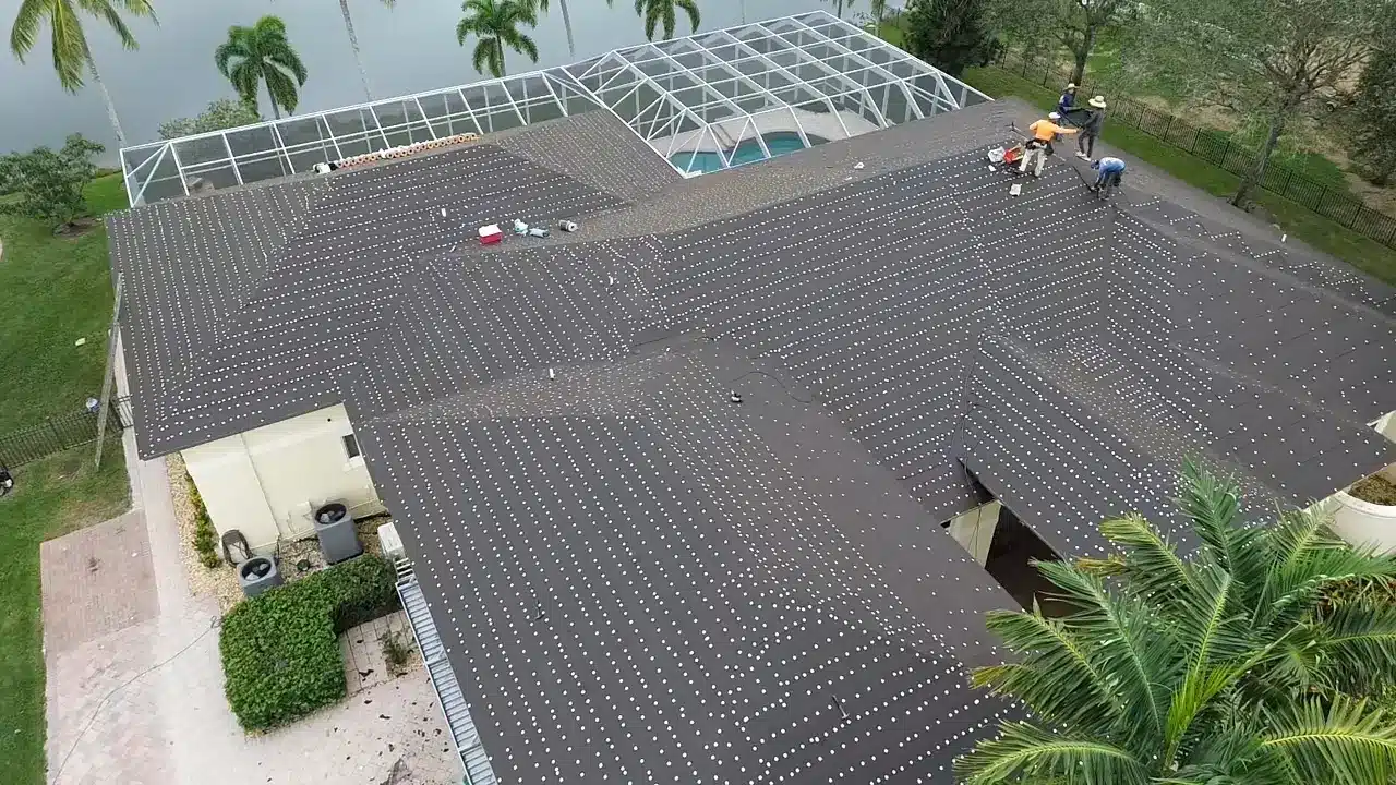 Aerial view of a Tropico Roofing project illustrating roof inspection in Miami